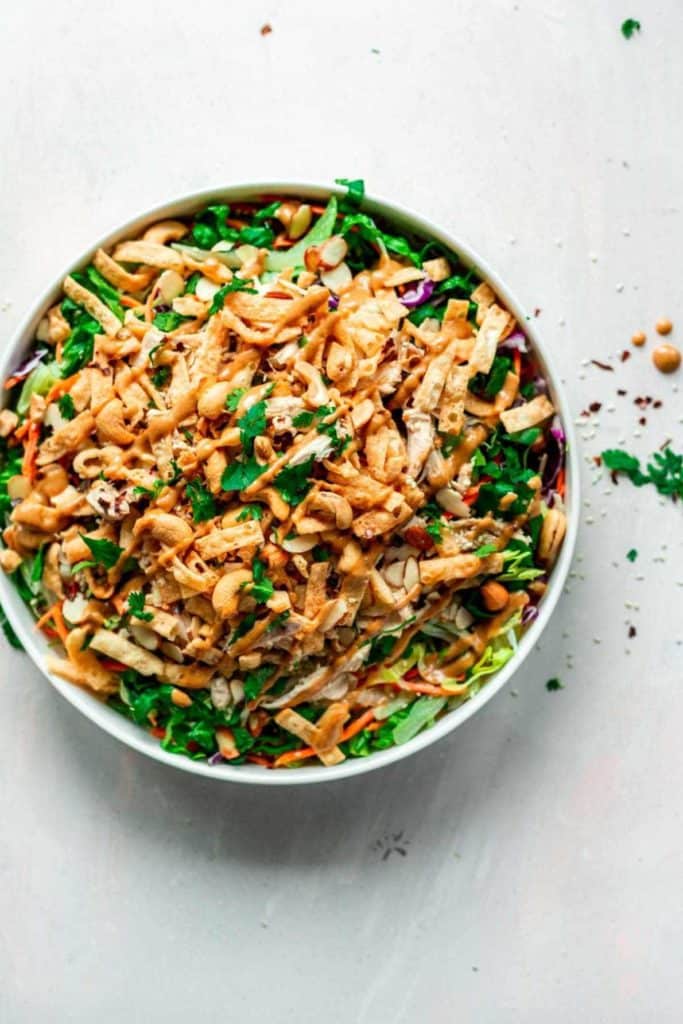 Asian chopped salad with rotisserie chicken and peanuts.