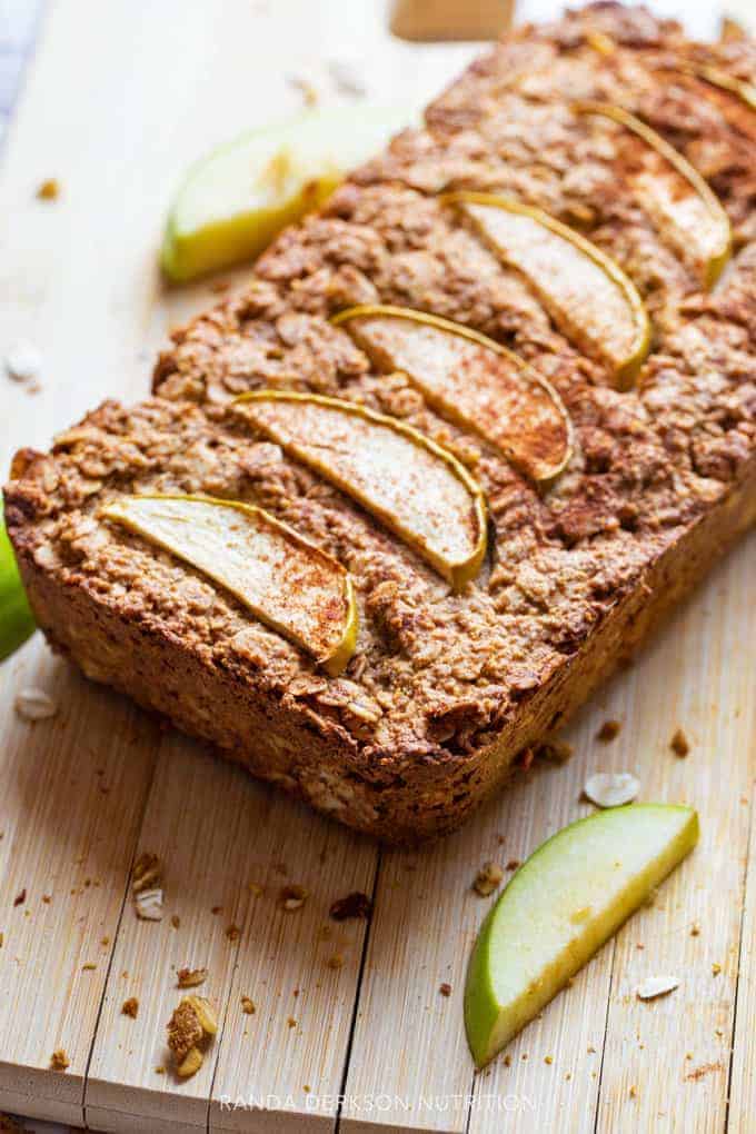 apple oatmeal bars on a maple cutting board