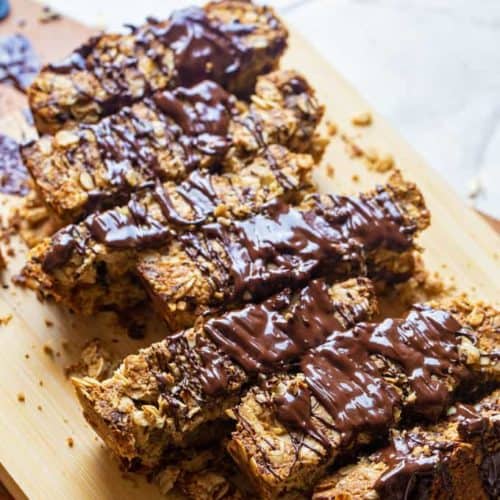 melted dark chocolate over sliced banana bars