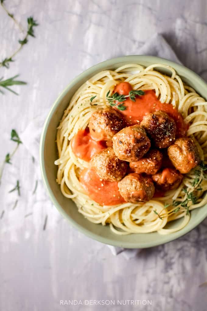 veggie loaded meatballs in a healthy tomato sauce over spaghetti