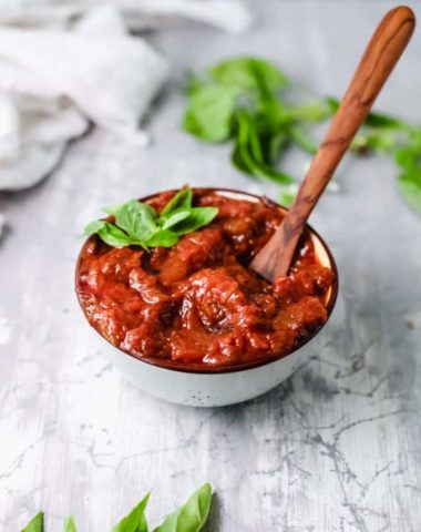 healthy tomato sauce in a bowl with basil