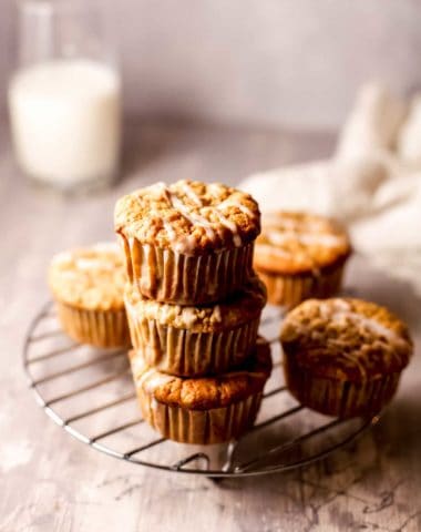 healthy gluten free apple muffins stacked on each other