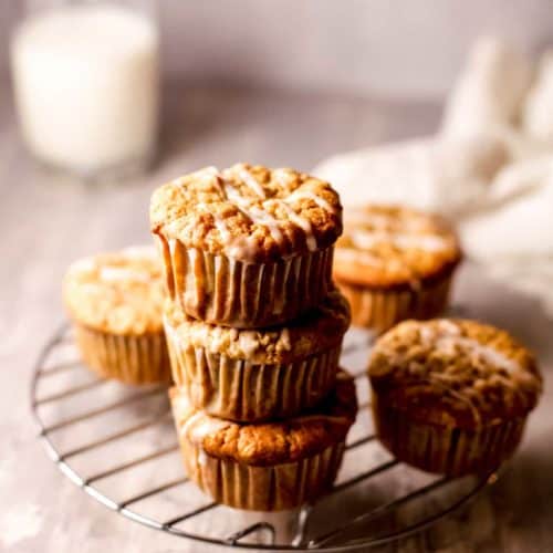 healthy gluten free apple muffins stacked on each other