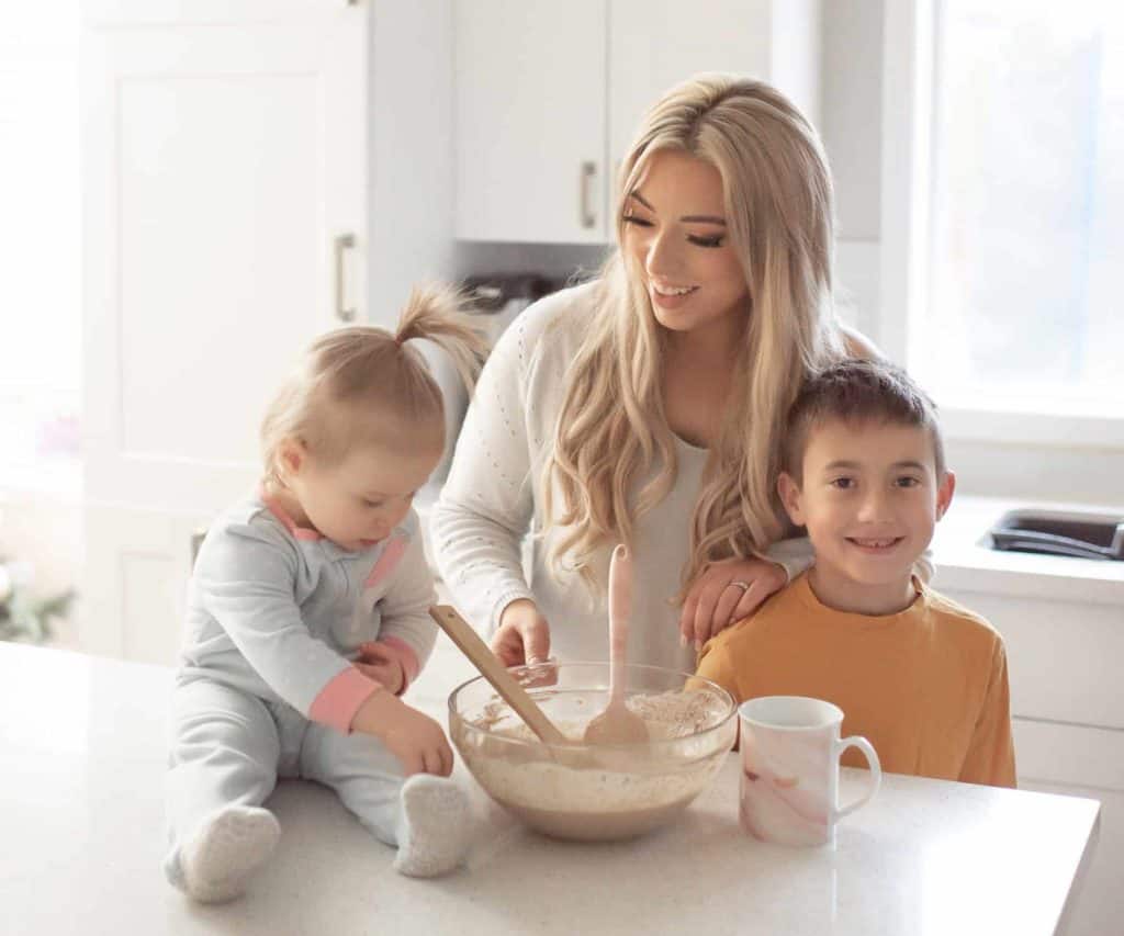 Mom and kids cooking breakfast