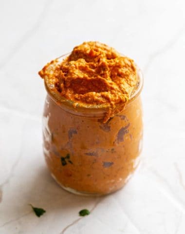 romesco sauce in a glass jar