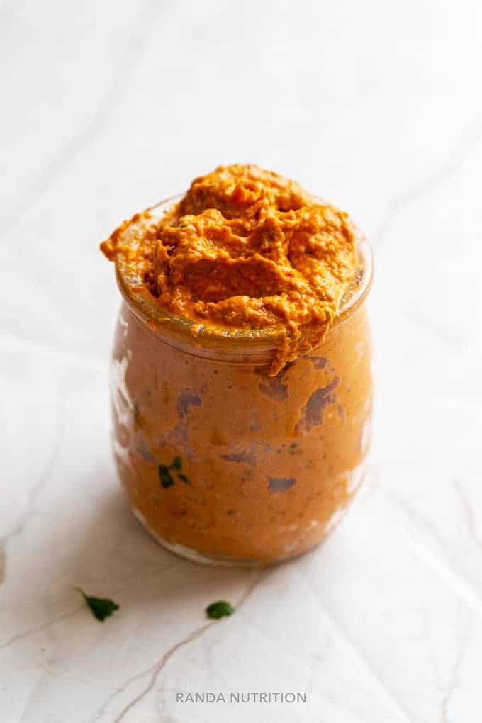 romesco sauce in a glass jar