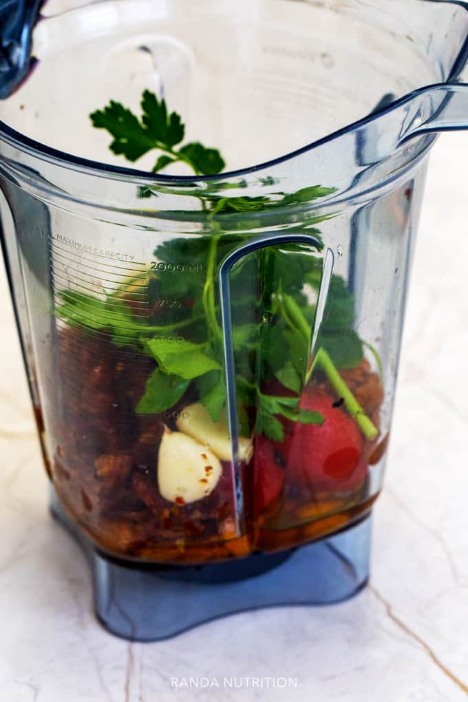 Ingredients for romesco sauce in a Vitamix blender