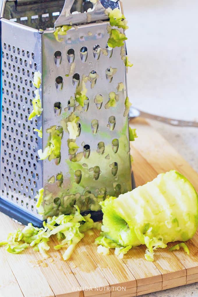 grating apples with a cheese grater