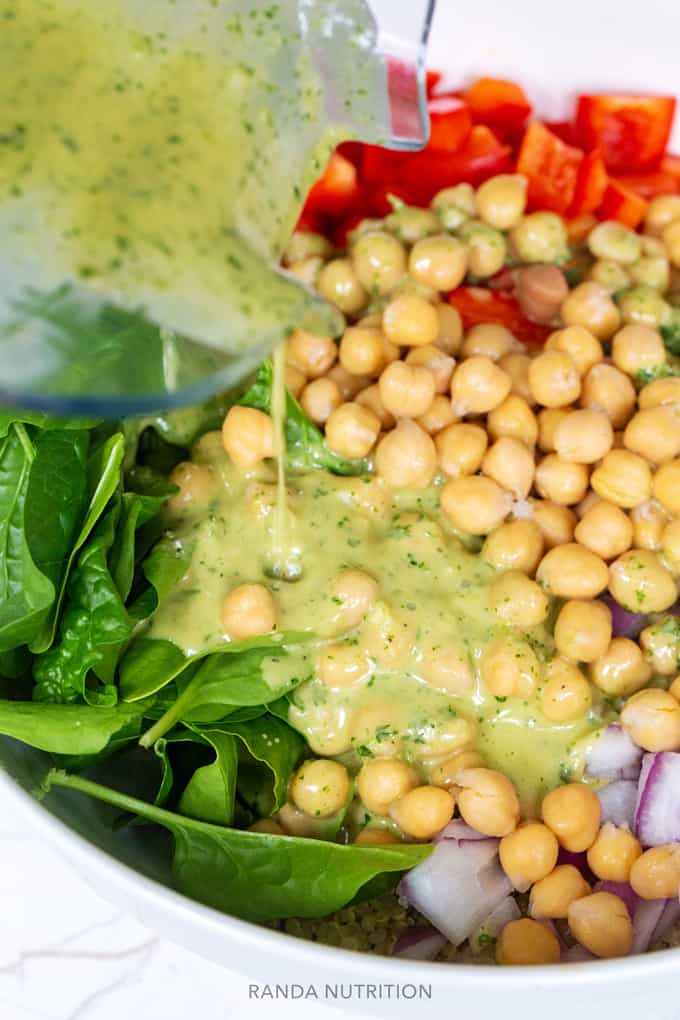 red wine vinaigrette poured over a quinoa salad