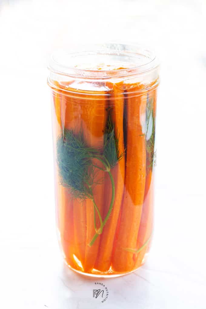 carrots, dill, and garlic in a brine