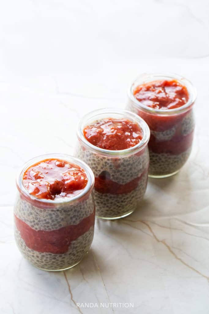 three strawberry rhubarb chia puddings