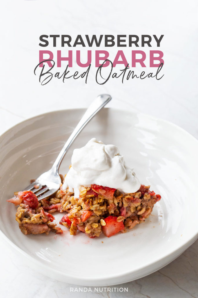 strawberry rhubarb baked oatmeal topped with coconut whipped cream