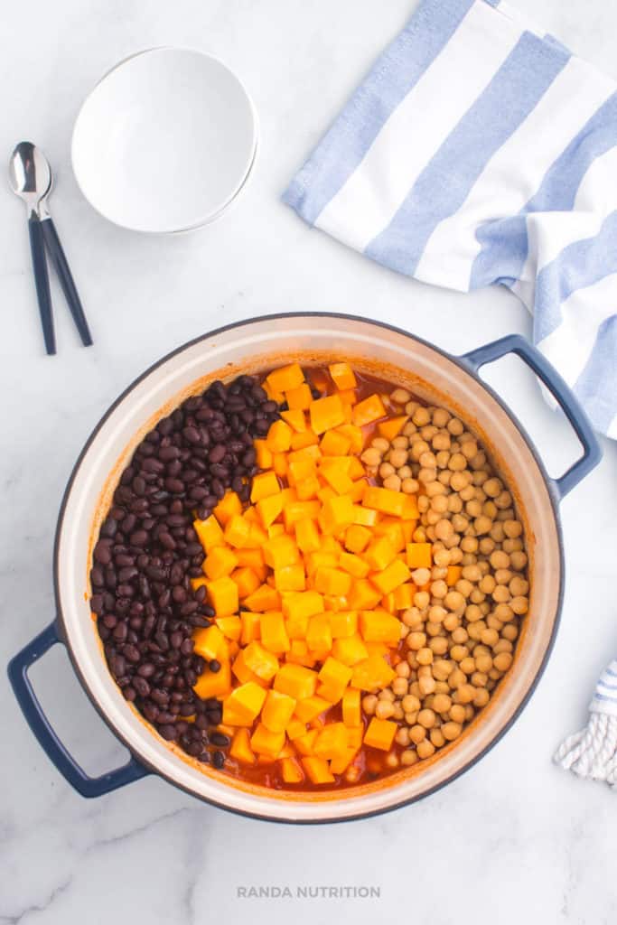 butternut squash, black beans, and chickpeas on top of chili