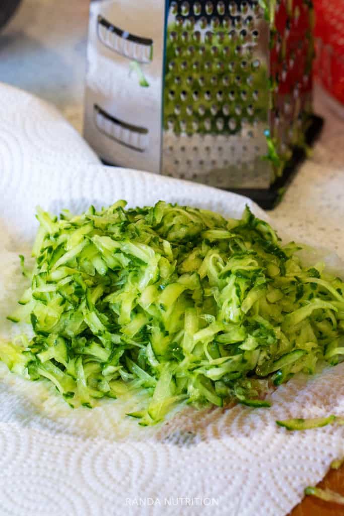 grated cucumber on a paper towel