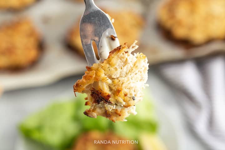 a forkful of cooked crab cakes