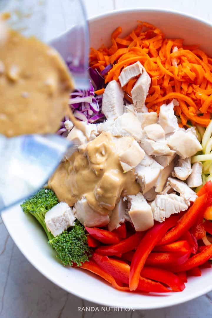 thai chicken veggie noodle salad with creamy peanut dressing