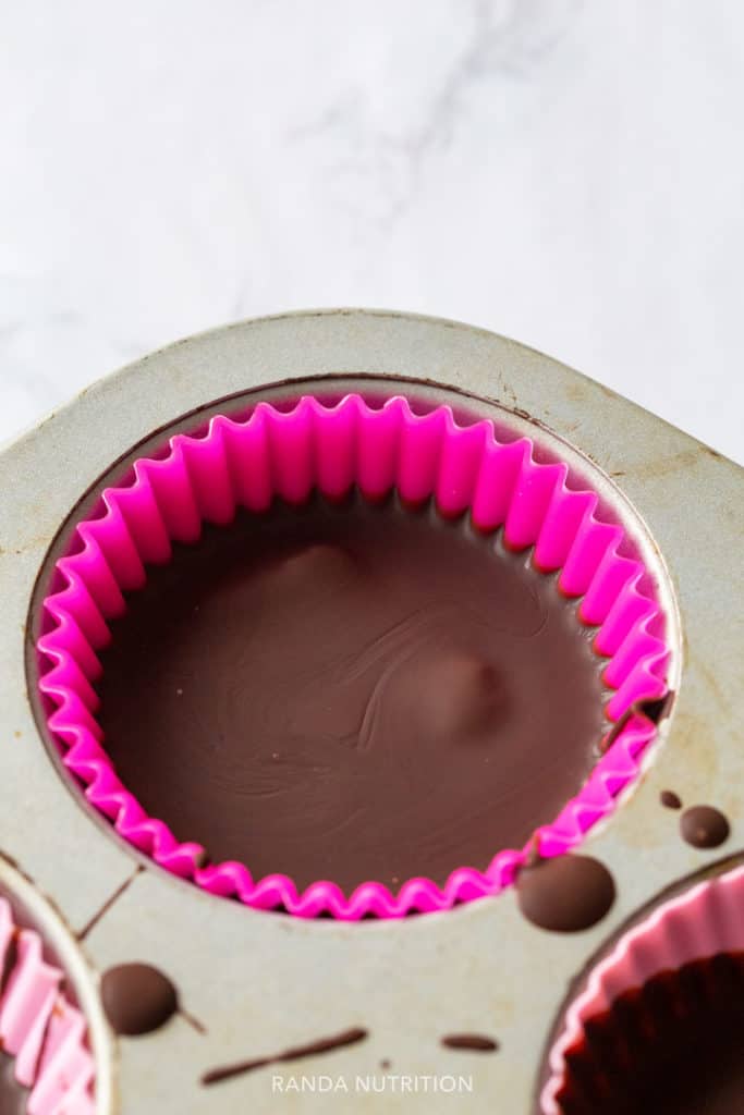 Set protein peanut butter cups in a muffin pan