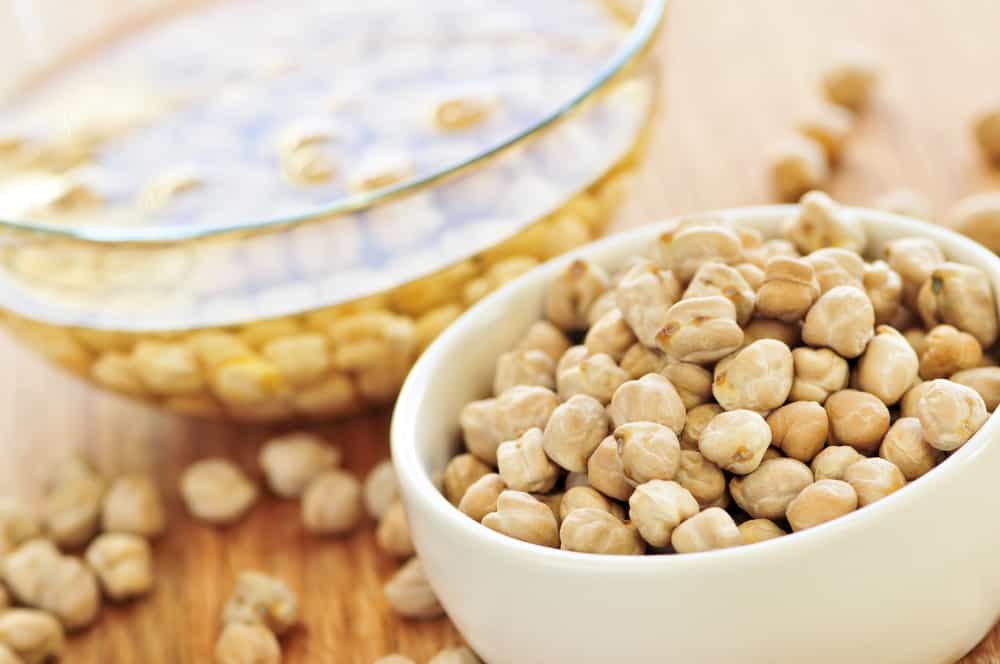 soaking chickpeas in a glass bowl