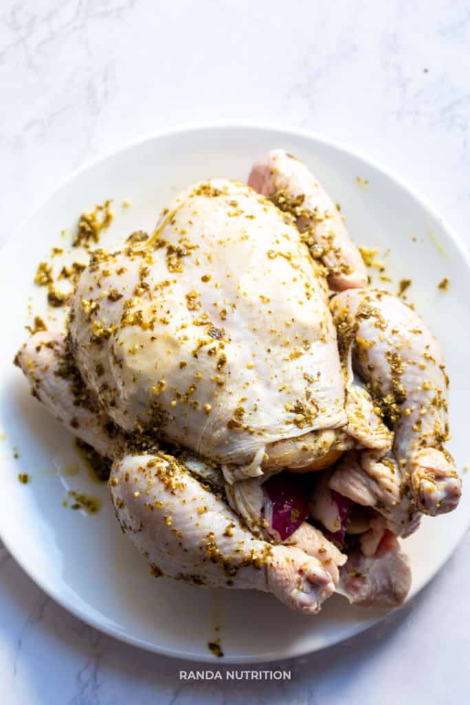 whole chicken rubbed with pesto