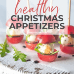 the pinterest image for this round up of healthy holiday recipes featuring bruschetta bites with basil and mozarella