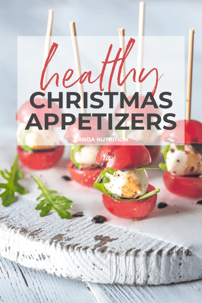 the pinterest image for this round up of healthy holiday recipes featuring bruschetta bites with basil and mozarella