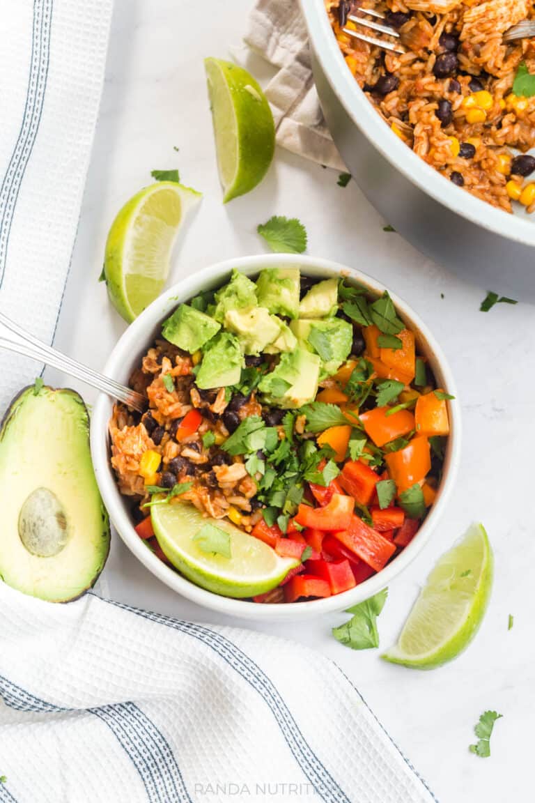 burrito bowl surrounded my avocado and lime in a Fable Home bowl