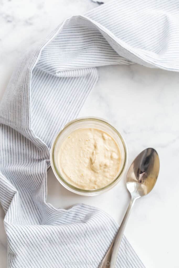 blue linens, mason jar filled with homemade cashew cream