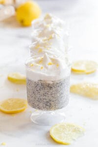 lemon slices along chia pudding topped with coconut whip cream