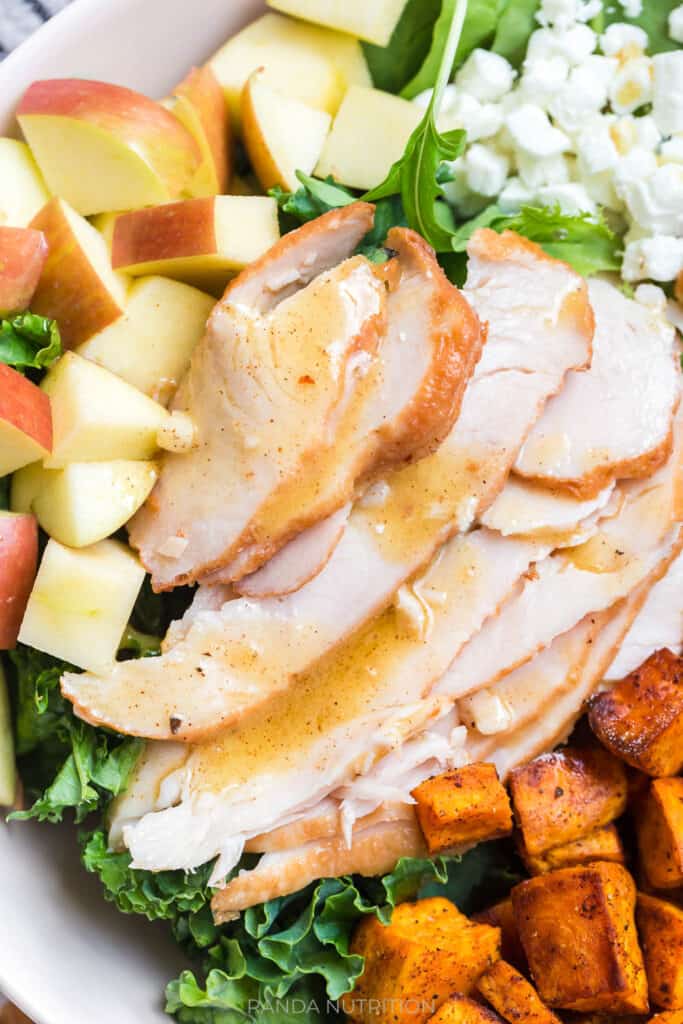 close up of cooked turkey turned into a salad with apple cider vinaigrette