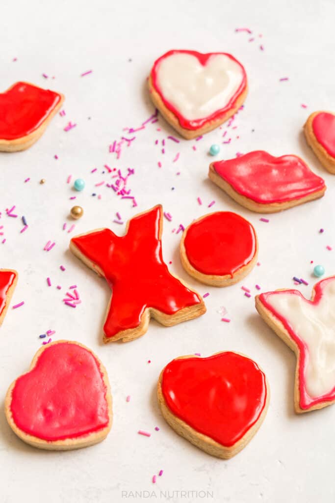 swerve sugar cookies with swerve royal icing in red, white, and pink for Valentines Day