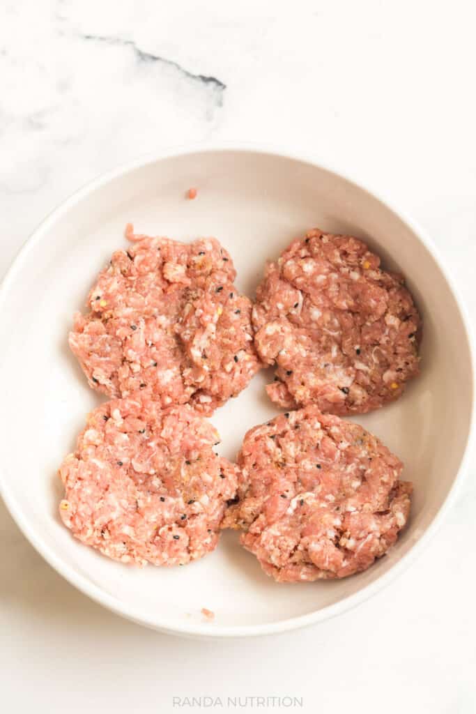 ground pork and spices shaped into patties