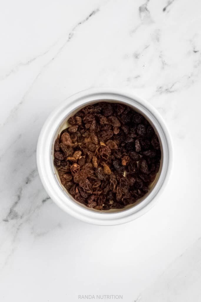 soaking raisins in hot water to plump them up