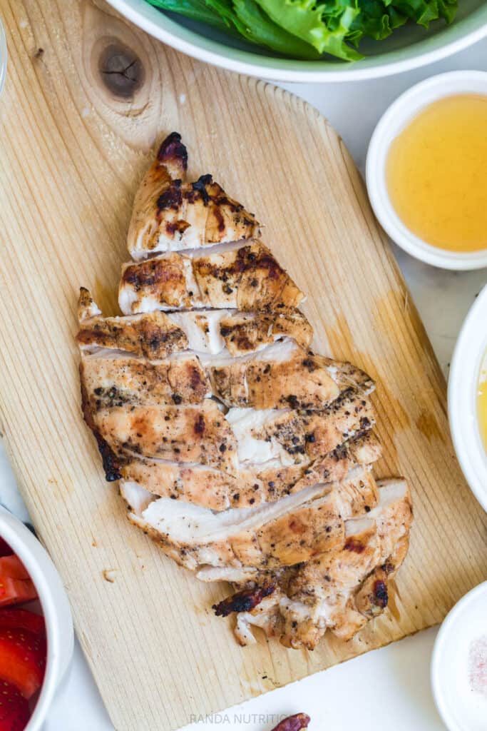 grilled chicken on a wood plank