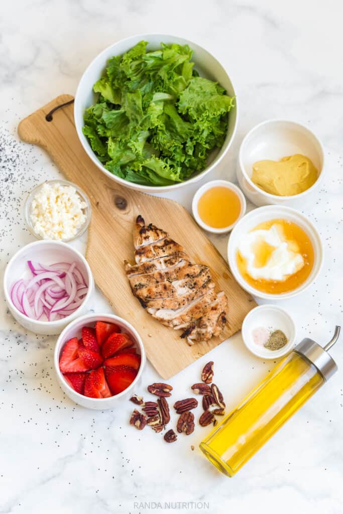 ingredients for a summer salad with strawberries and feta