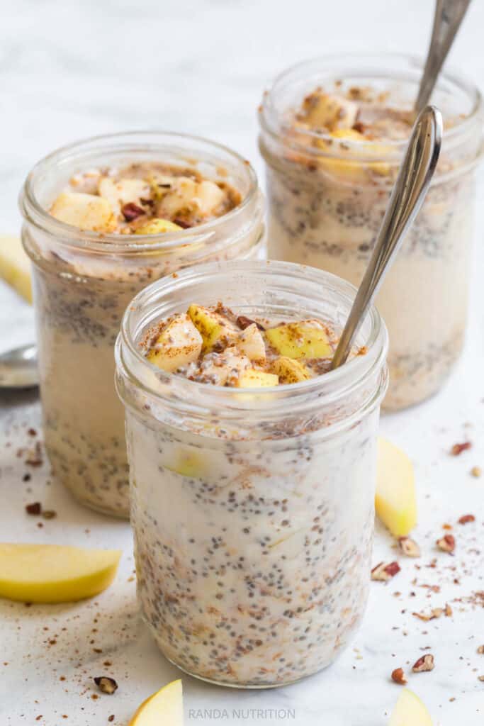 mason jar filled with chia seeds, oats, apples