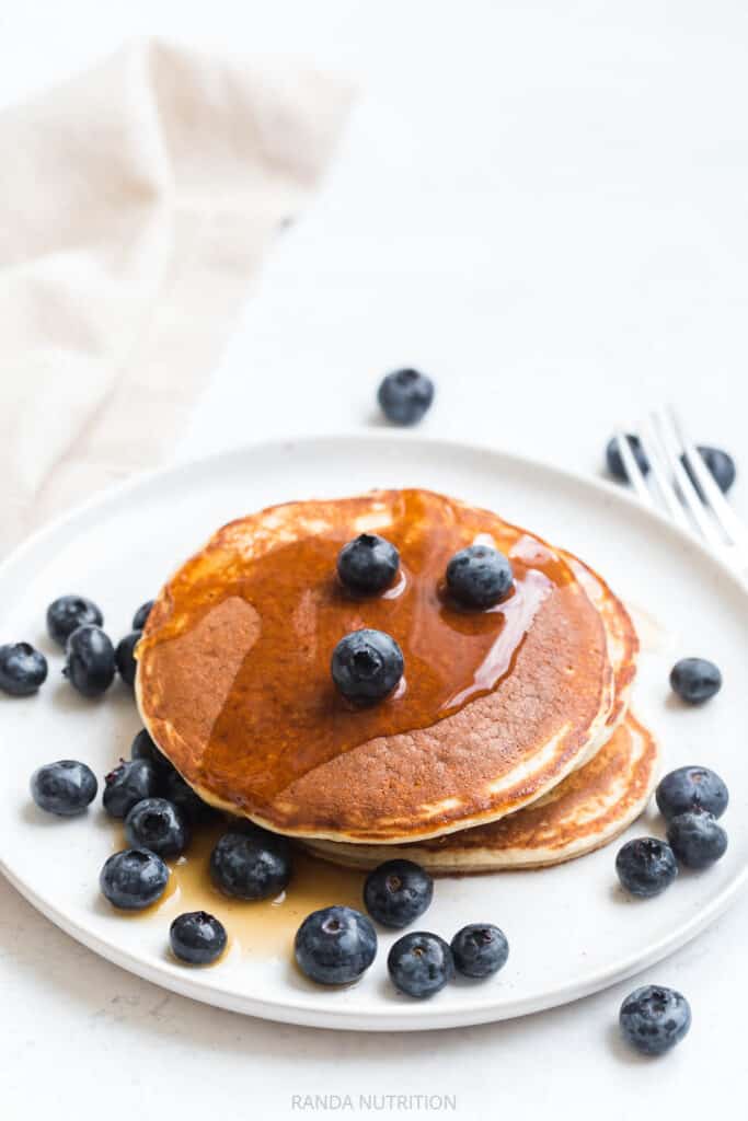 gluten free protein pancakes with blueberries and sugar free syrup