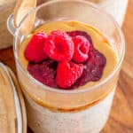 raspberry peanut butter and jam overnight oats in a glass meal prep jar