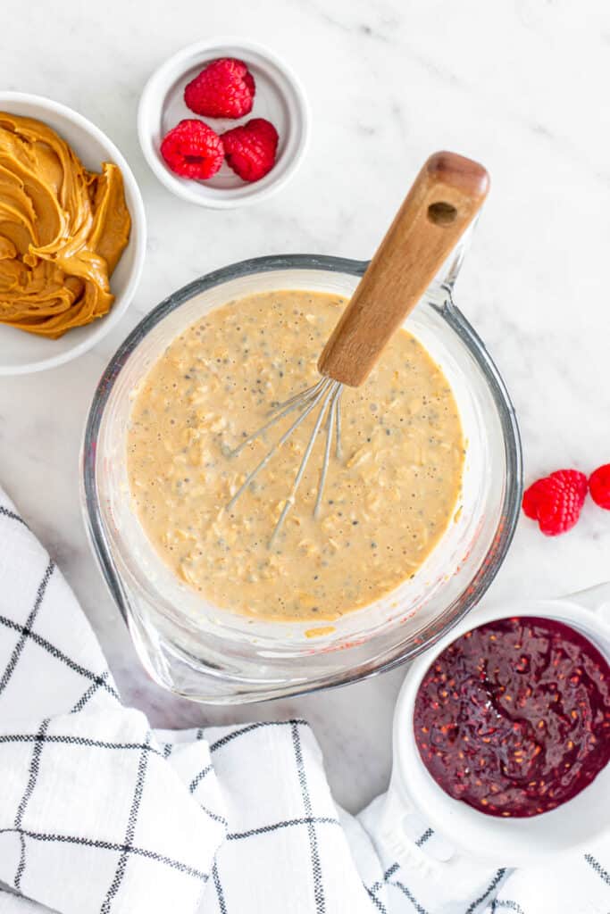 mixing overnight oats in a mixing bowl