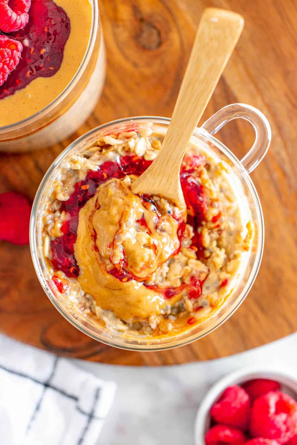 close up of peanut butter and jam mixed together with oatmeal