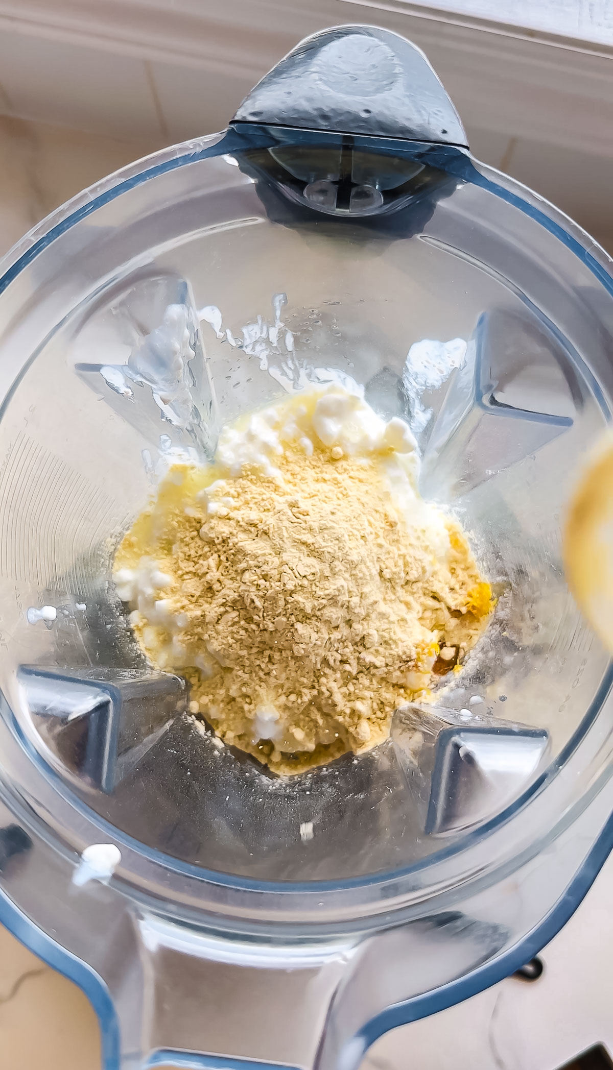 vanilla protein powder in a blender