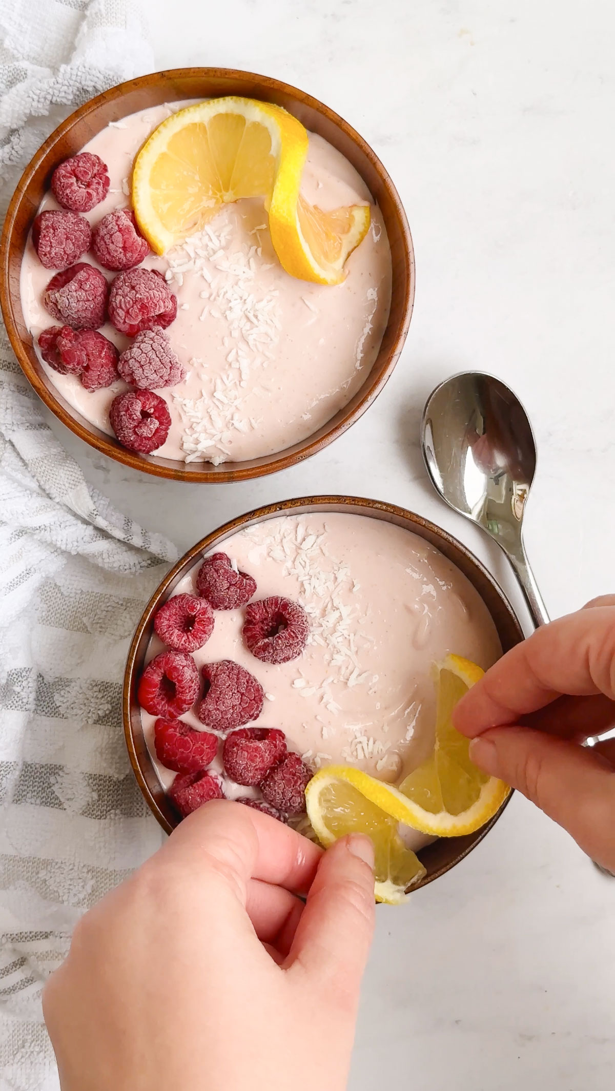 adding a twisted lemon to protein cottage cheese bowls