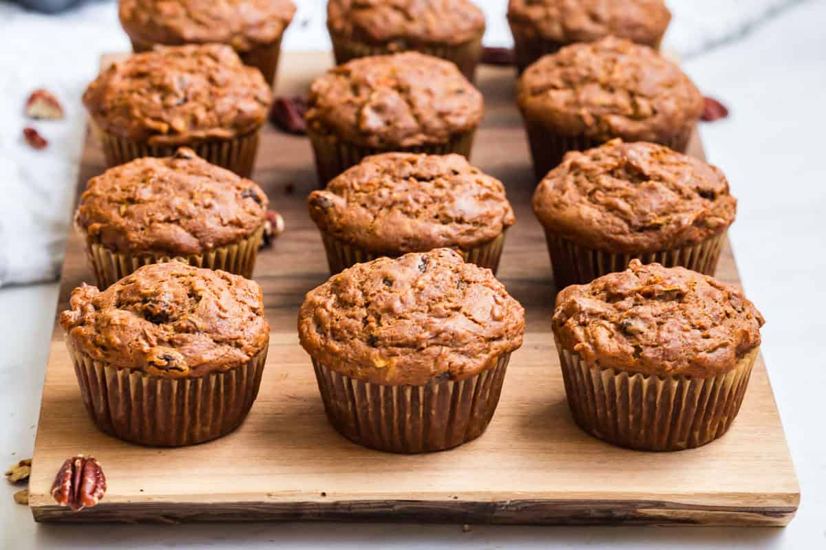 Gluten Free Morning Glory Muffins (Healthy & Moist) 10 gluten free muffins on a cutting board
